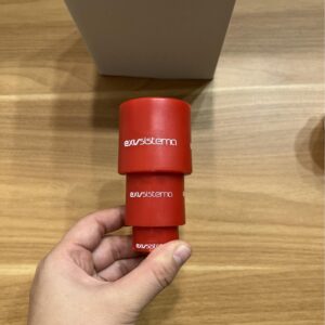 Red actuator body with "exvsistema" logo