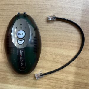 Device front, with buttons and RJ11 cable