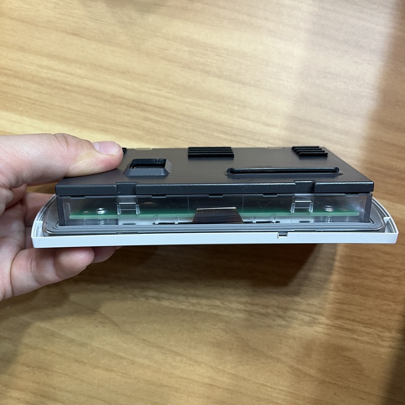 Device side view showing internal circuit board