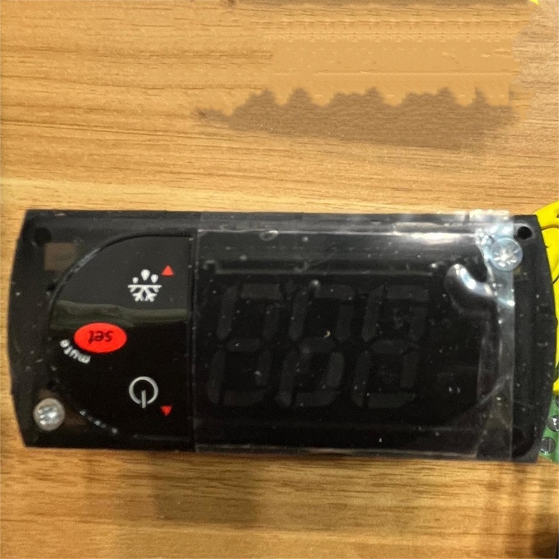 Temperature controller front with buttons and display