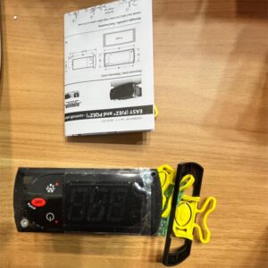 Temperature controller, manual and accessories.