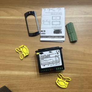 Complete kit including controller, mounting frame, clips, terminals and manual.