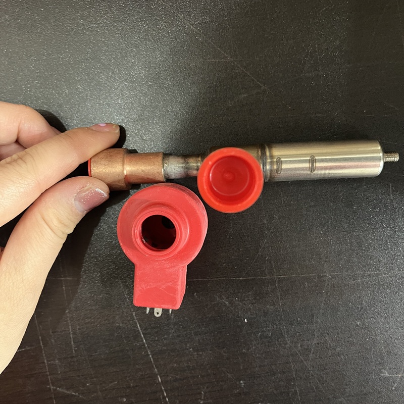 Valve body and coil, showing port details