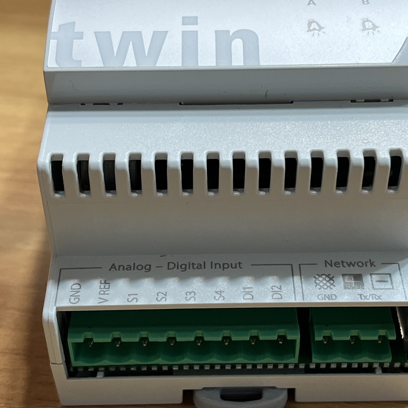 Close-up of the device's upper output terminals