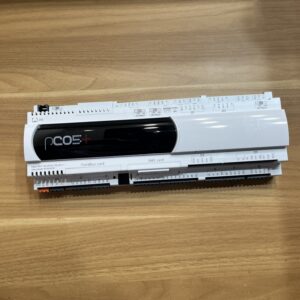 Front view of the industrial controller model P+500B0A000L0, featuring a display area, terminal blocks, and expansion card slots.