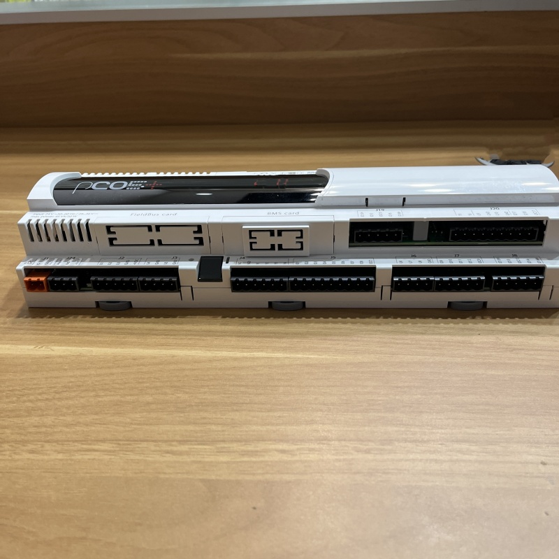 Front-side view of the controller, clearly showing all terminal blocks and expansion interfaces.