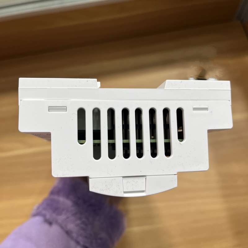 Close-up of the controller's top, with a row of ventilation grilles visible.