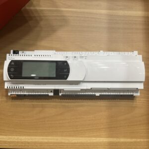 Front view of a white industrial controller with an LCD display
