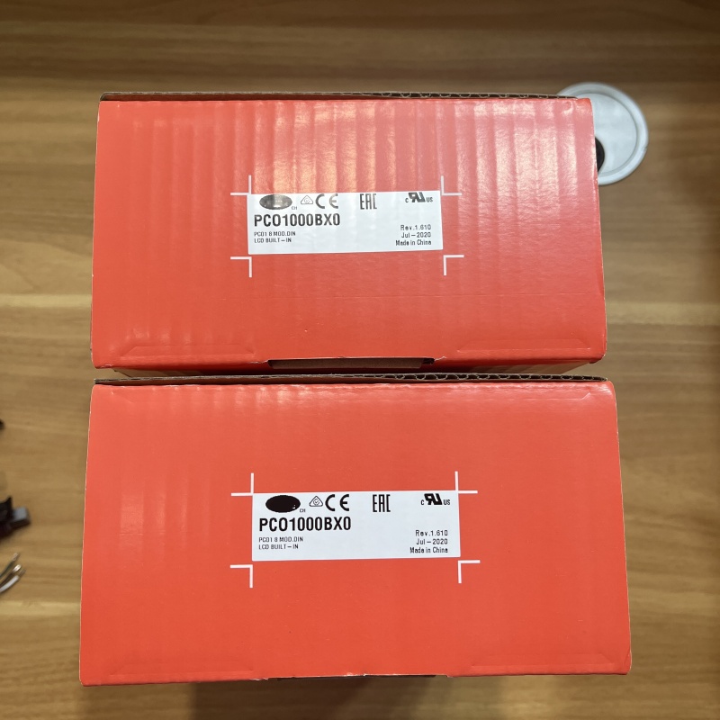 Two orange product packaging boxes with printed model numbers