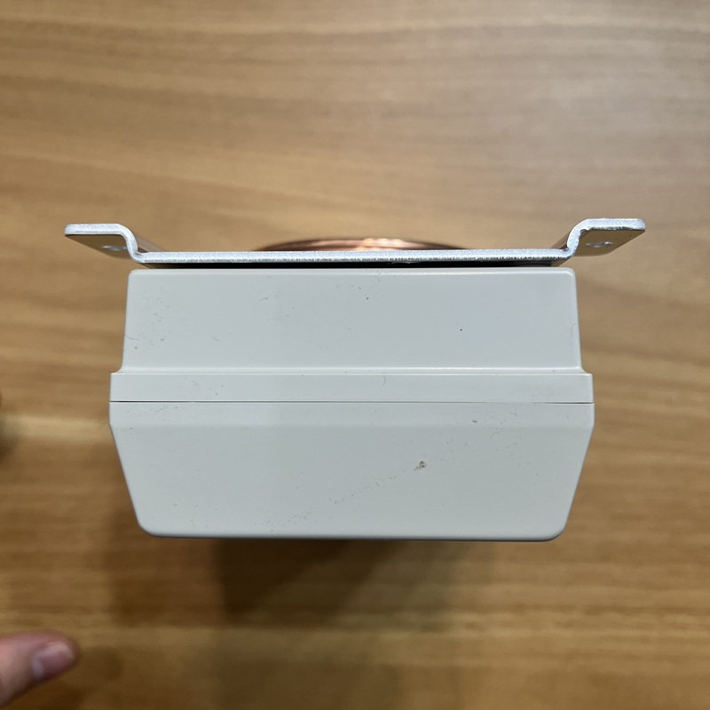 Top-down bottom view, metal mounting brackets on both sides