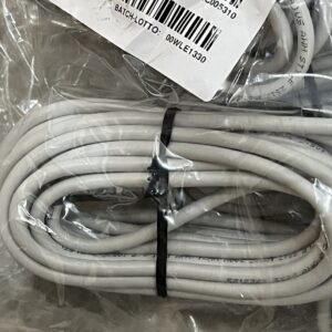 Close-up of batch label and coiled connecting cable details