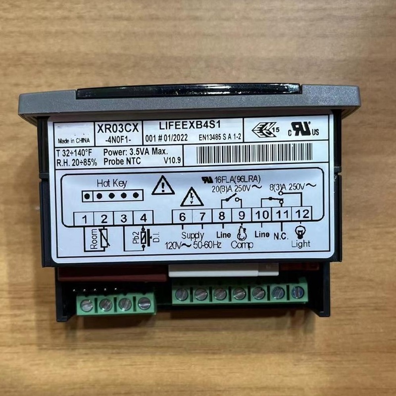 Back view of the temperature controller, showing model marking and terminal definitions.