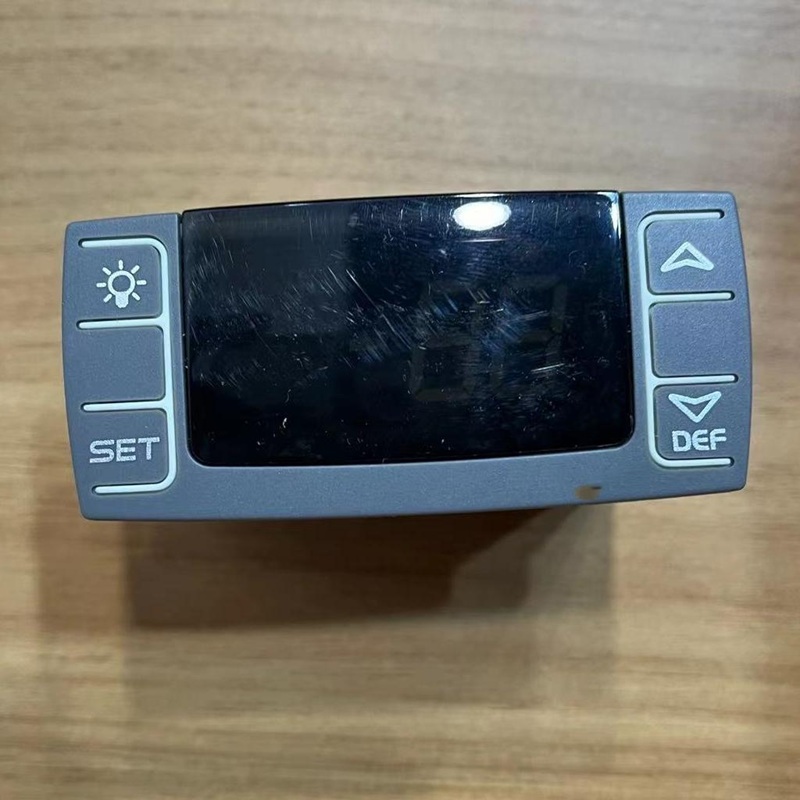 Front view of the temperature controller with display and function keys.