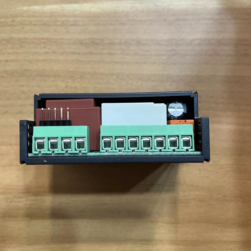 Bottom view of the controller, exposing the terminal blocks.