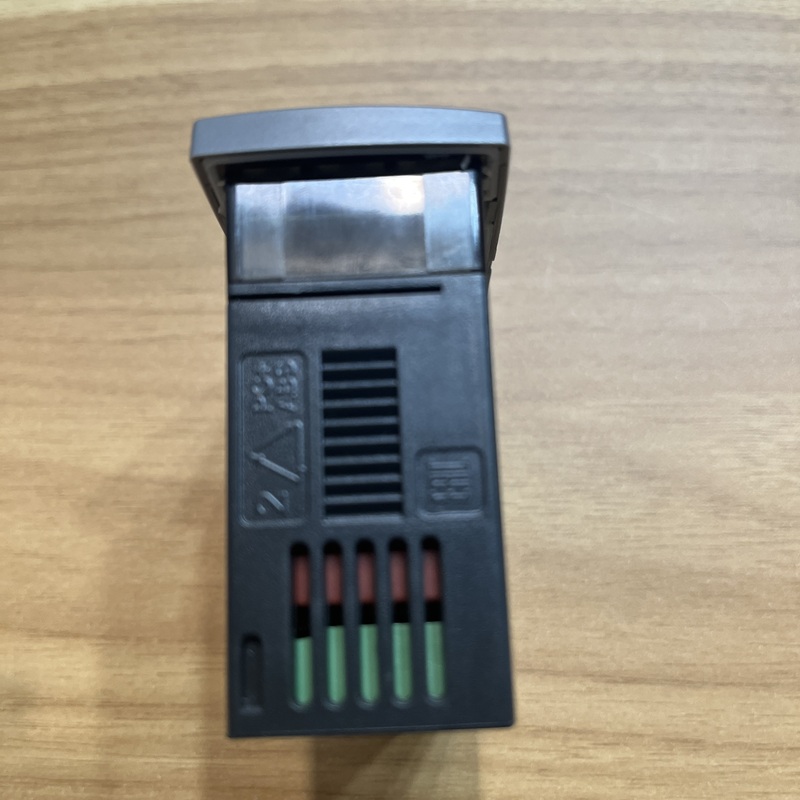 Thermostat side view, molded certification marks, eco-label and multiple heat dissipation vents