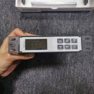 Front of temperature controller panel with digital display and six function buttons