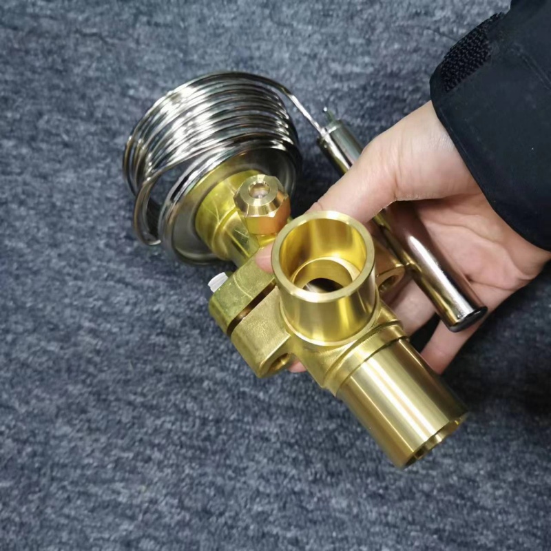 Handheld shot of brass valve pipeline ports