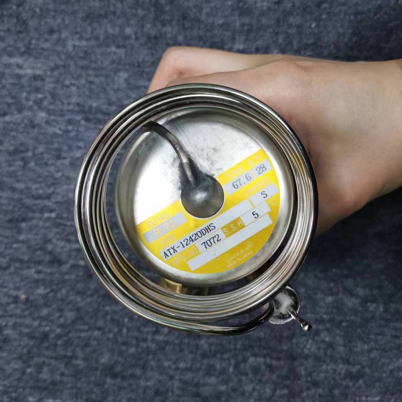 Close-up of label on valve power head