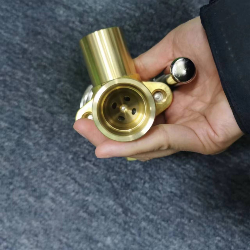 Outlet connection close-up, internal throttle hole visible