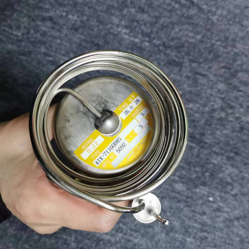 Close-up of expansion valve power head label and capillary tube